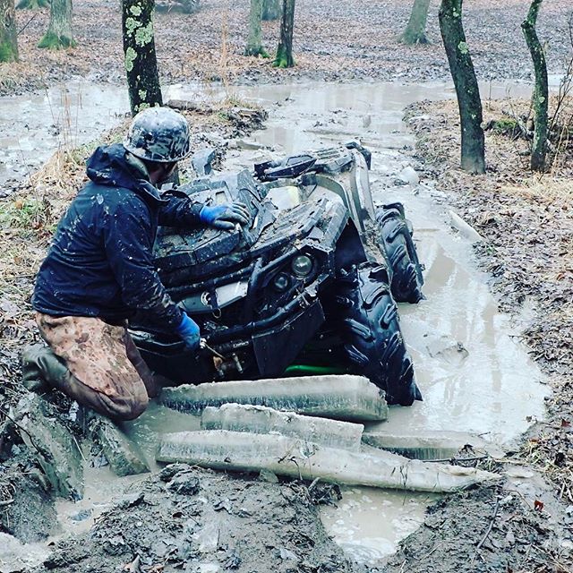 Sure the #snow is almost gone, but the #ice is still thick. @martin_g_ace getting the #winch out for the #outlander #canam #swampdonkeys