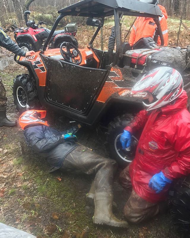 @tomdrich assessing the damage to the #rzr skid plates. @chriscross4653 never misses an opportunity to get down on his knees. #swampdonkeys #broken #rzr