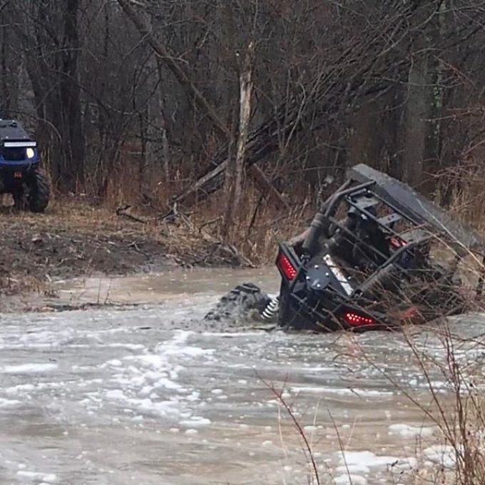 #swampdonkeys @swampdonkeygrizz found a little bump in the #river on his #polaris #rzr