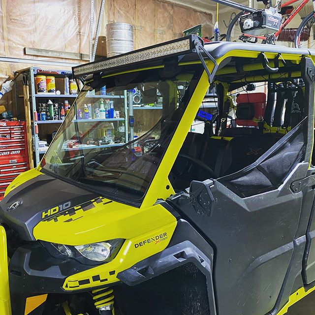 Finally getting some things started again. Lightbar up top and the axe  mounted up. #canam #defenderxmr #CanAmMonsters #SwampDonkeys